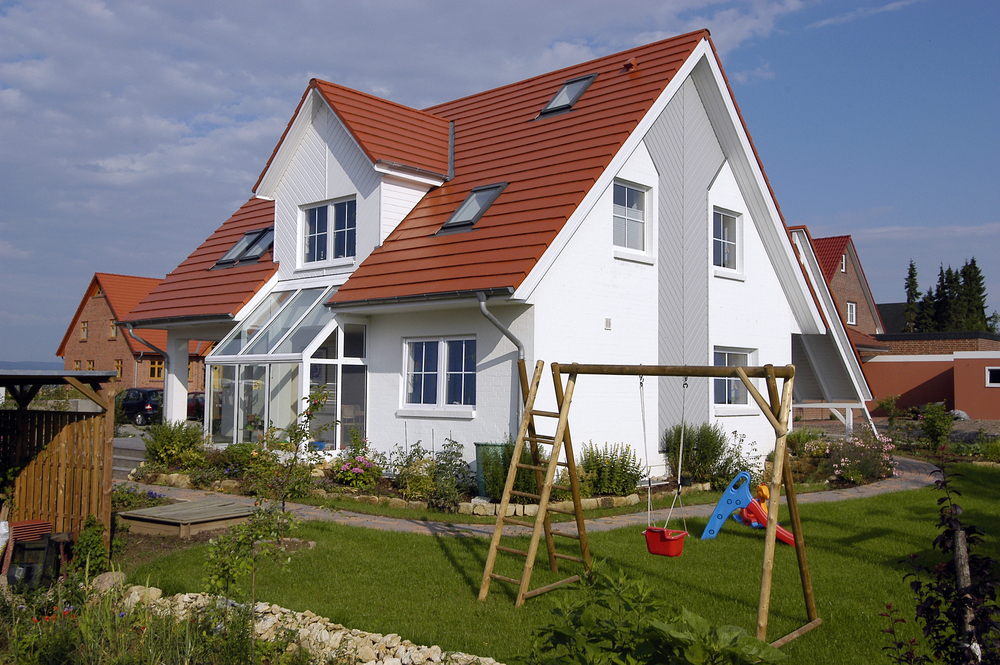 Haus mit kleinem Wintergarten